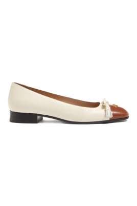 white-flat-shoes-with-tassel-detailing