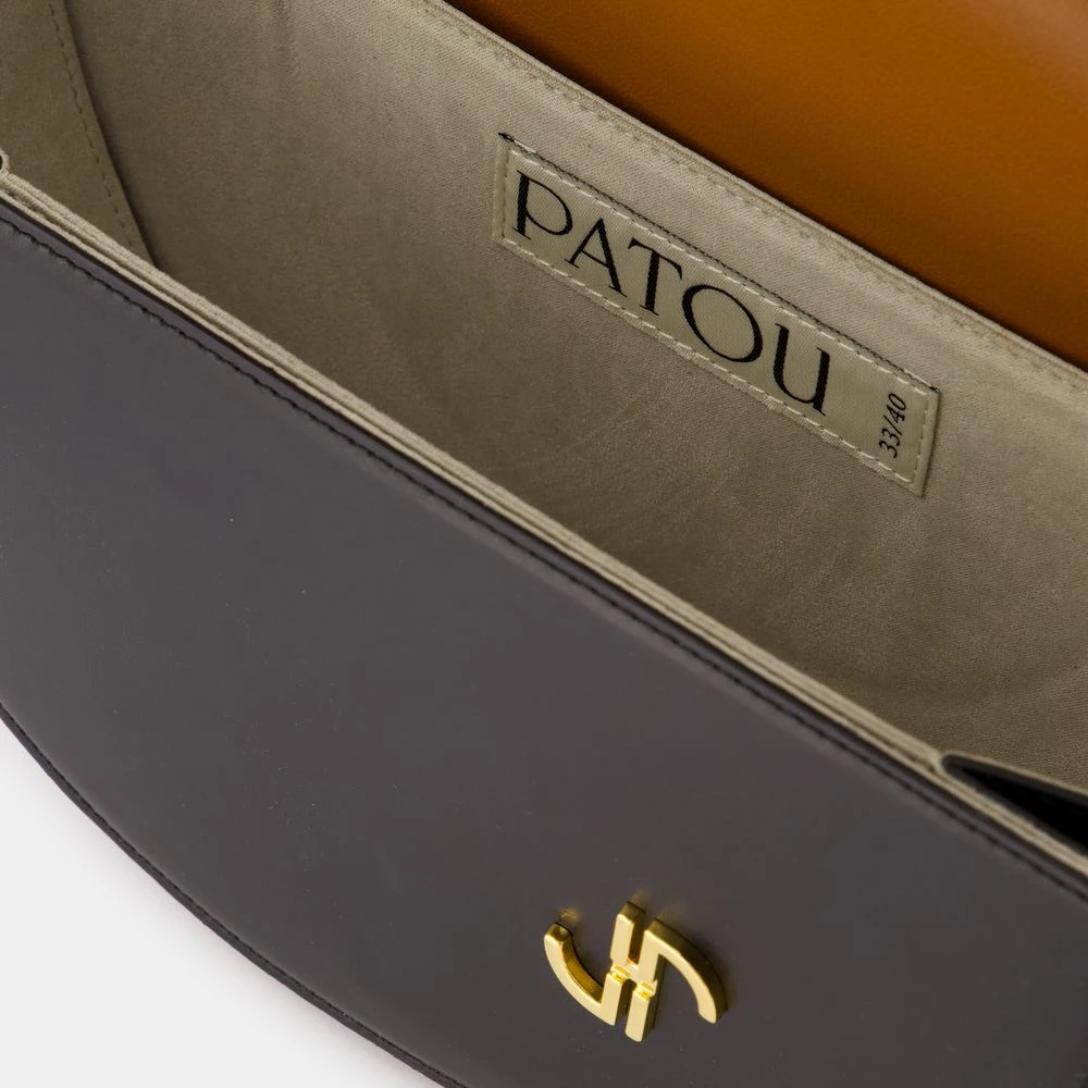Patou Zwarte Leren Schoudertas met Top Handvat Black Dames