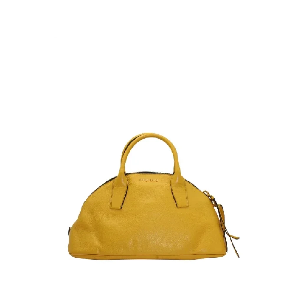 Miu Pre-owned Leather handbags Yellow Dames