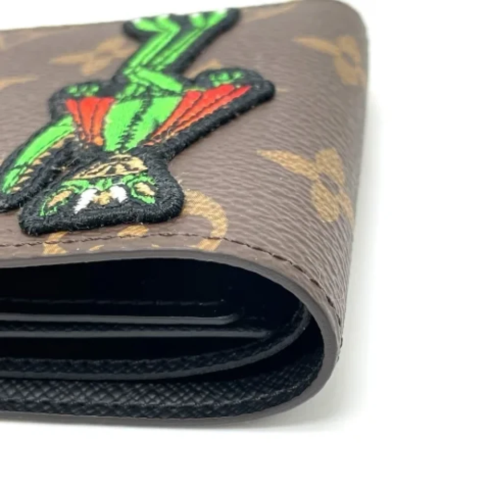 Louis Vuitton Vintage Pre-owned Canvas wallets Brown Heren