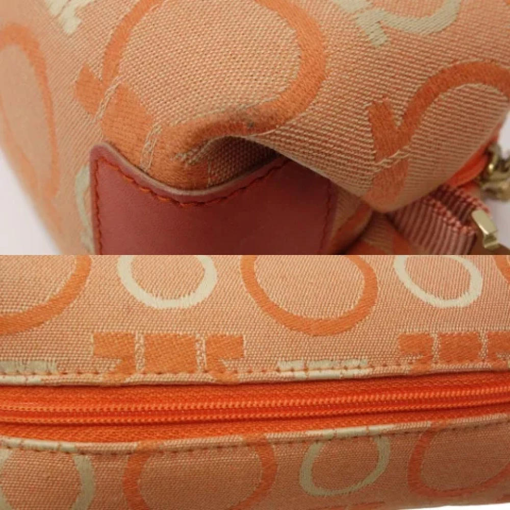 Salvatore Ferragamo Pre-owned Canvas pouches Orange Dames