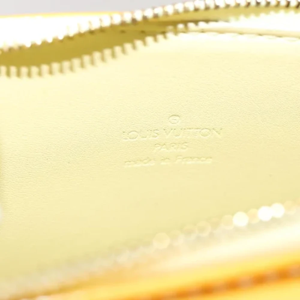 Louis Vuitton Vintage Pre-owned Leather clutches Yellow Dames