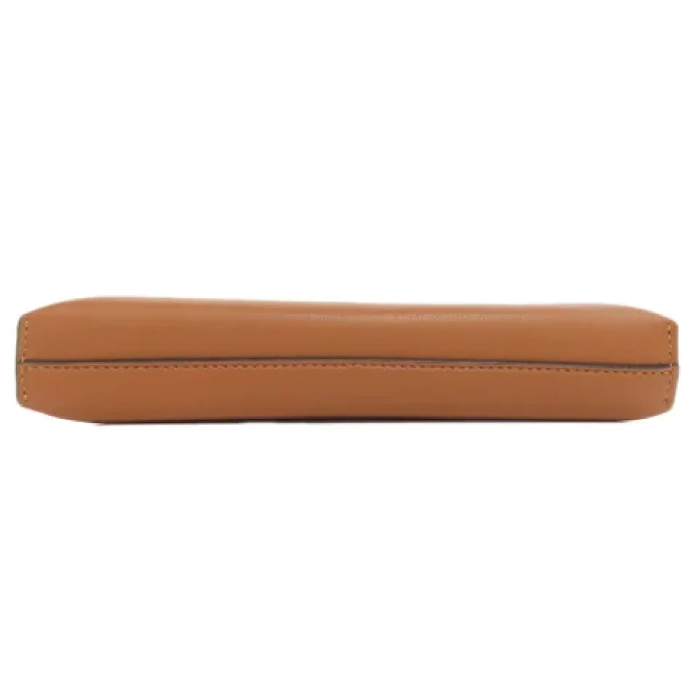 Loewe Pre-owned Leather pouches Brown Dames