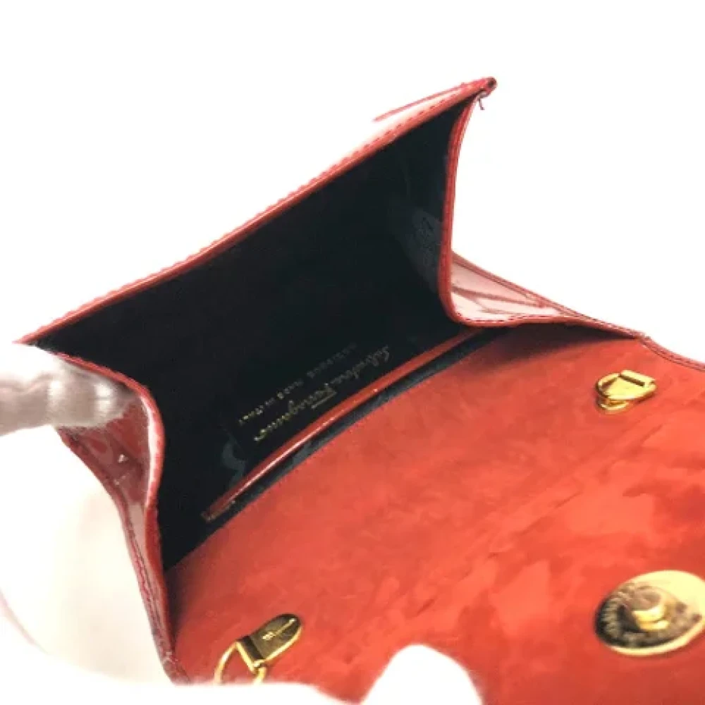 Salvatore Ferragamo Pre-owned Leather pouches Orange Dames