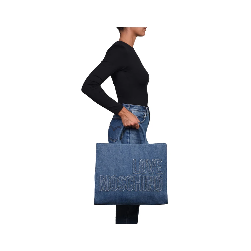 Moschino Blauwe handtas met gouden details Blue Dames