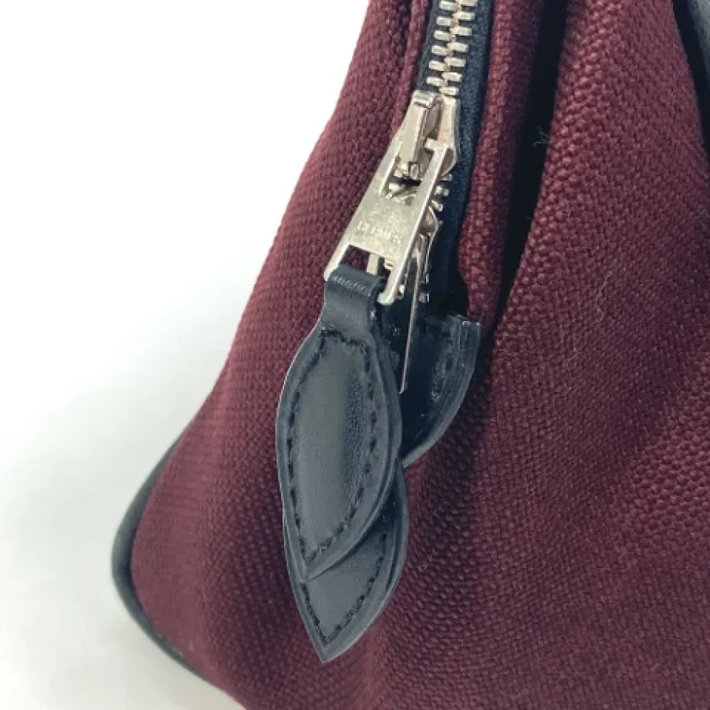 Hermès Vintage Pre-owned Fabric clutches Red Dames