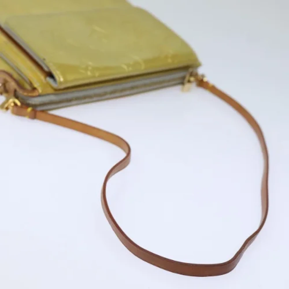 Louis Vuitton Vintage Pre-owned Leather clutches Yellow Dames