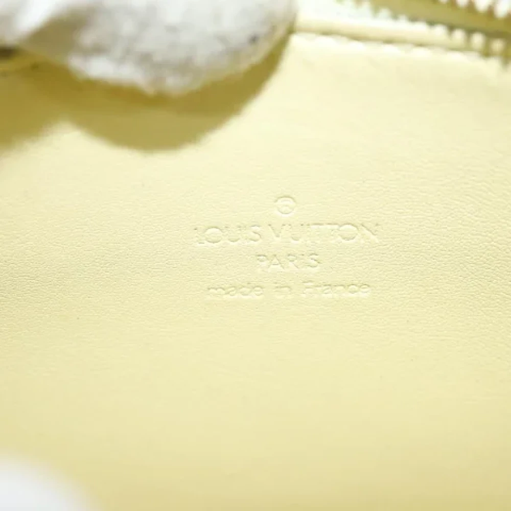 Louis Vuitton Vintage Pre-owned Leather clutches Yellow Dames