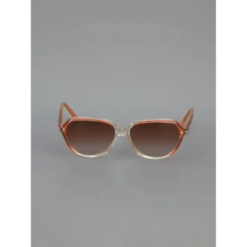 Yves Saint Laurent Vintage Pre-owned Acetate sunglasses Orange Dames