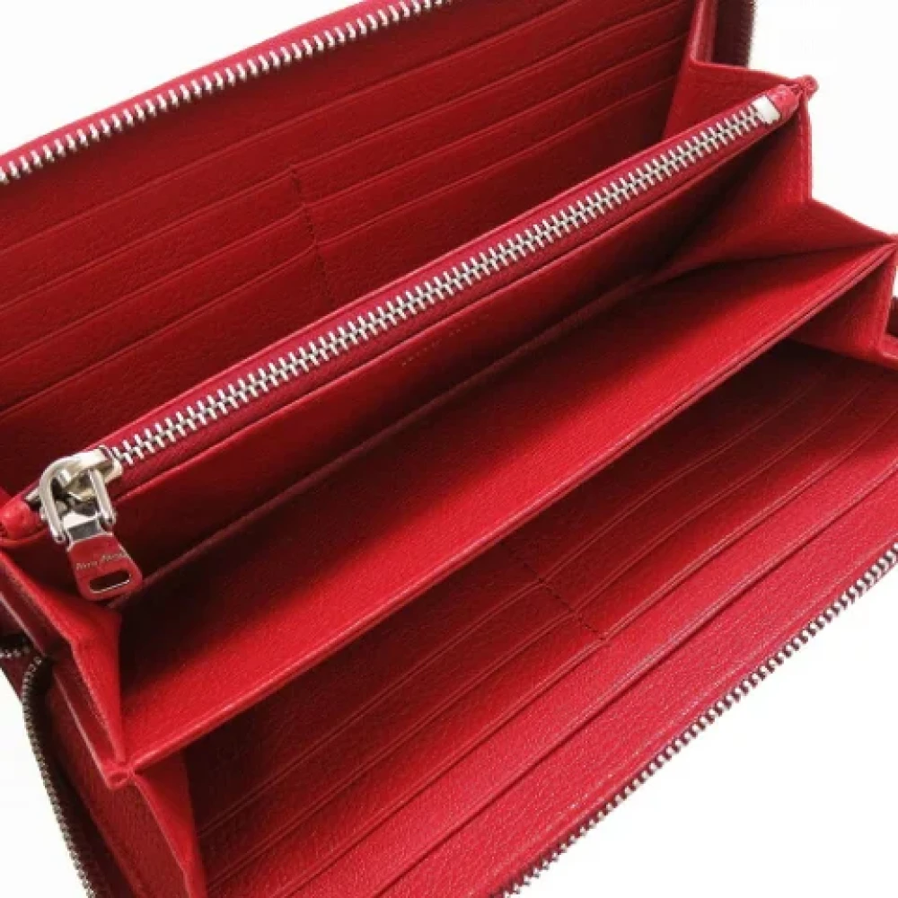 Miu Pre-owned Leather wallets Red Dames