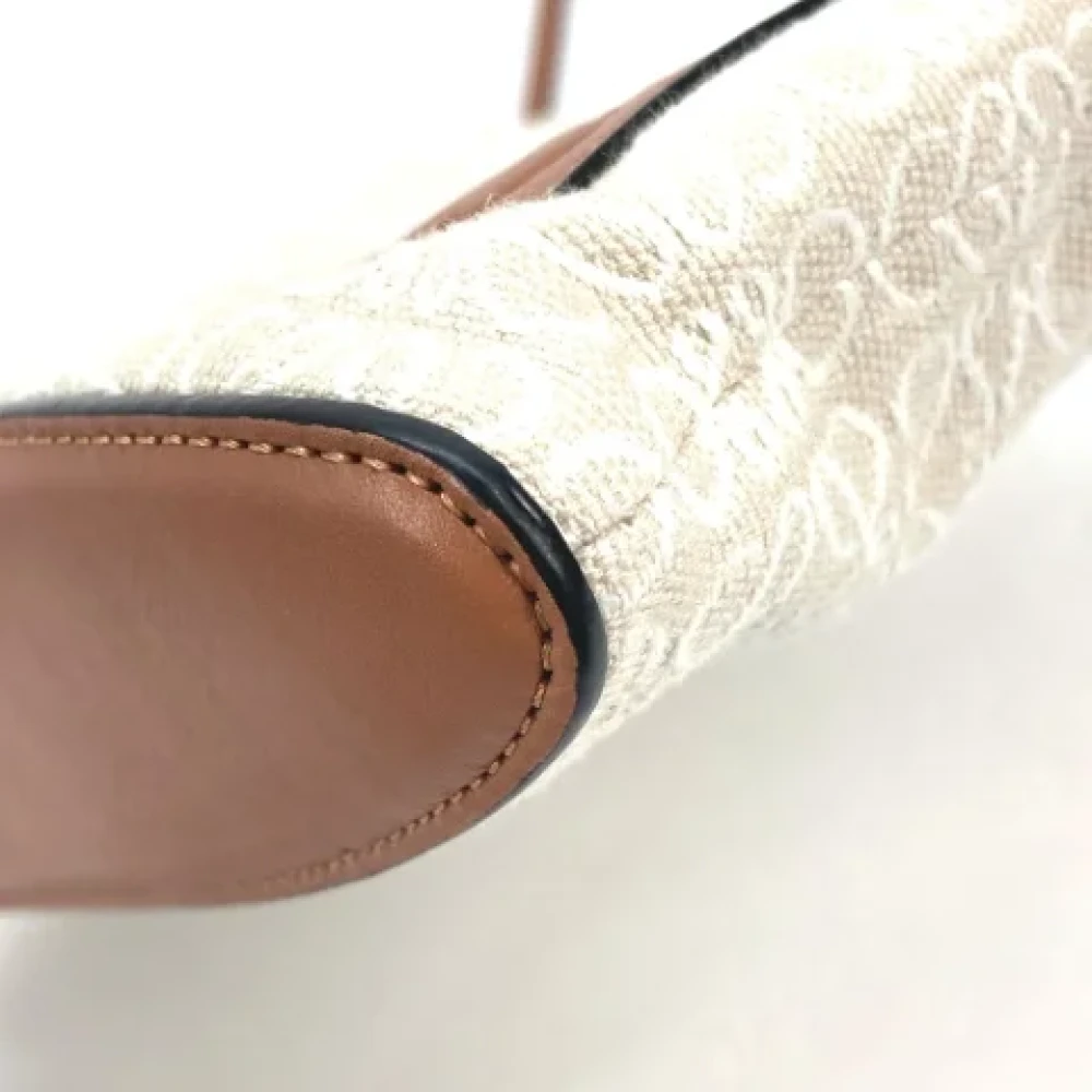 Loewe Pre-owned Fabric clutches Beige Heren