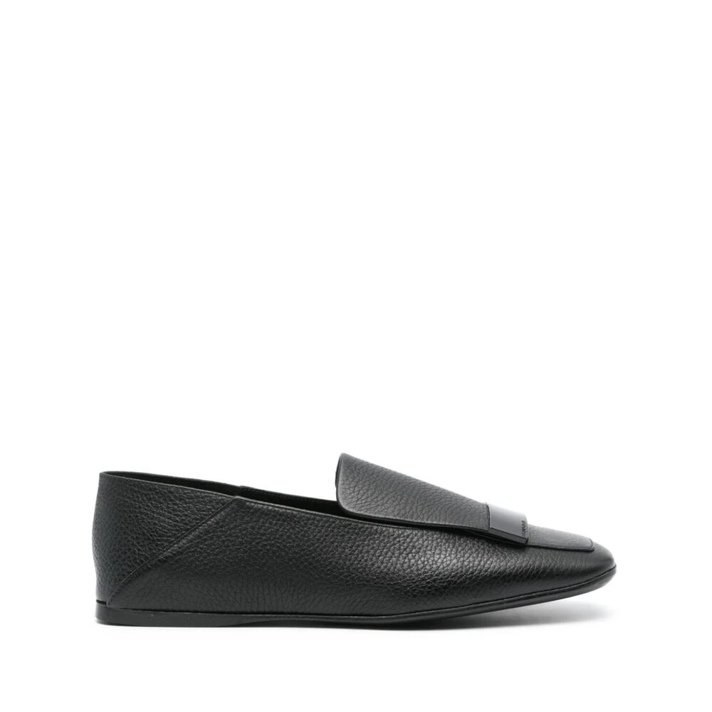 Svarte skinn slip-on sko