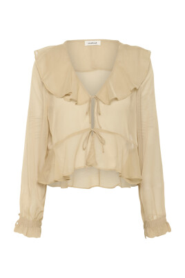 elegant-v-ringad-blus-med-ruffle-detaljer