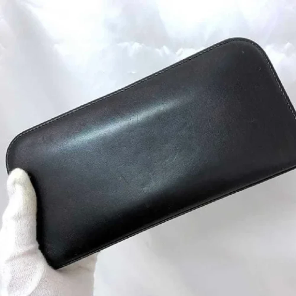 Yves Saint Laurent Vintage Pre-owned Leather wallets Black Dames