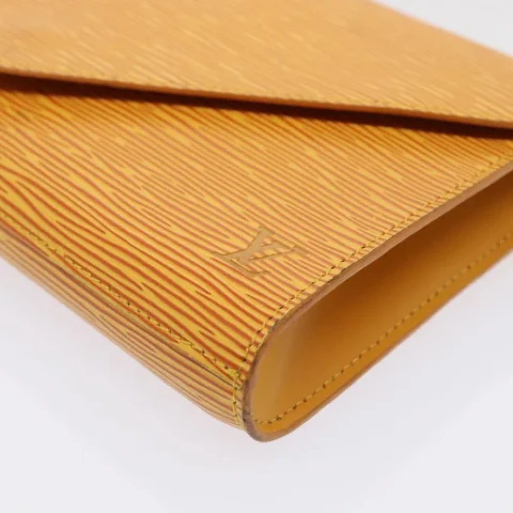 Louis Vuitton Vintage Pre-owned Leather clutches Yellow Dames