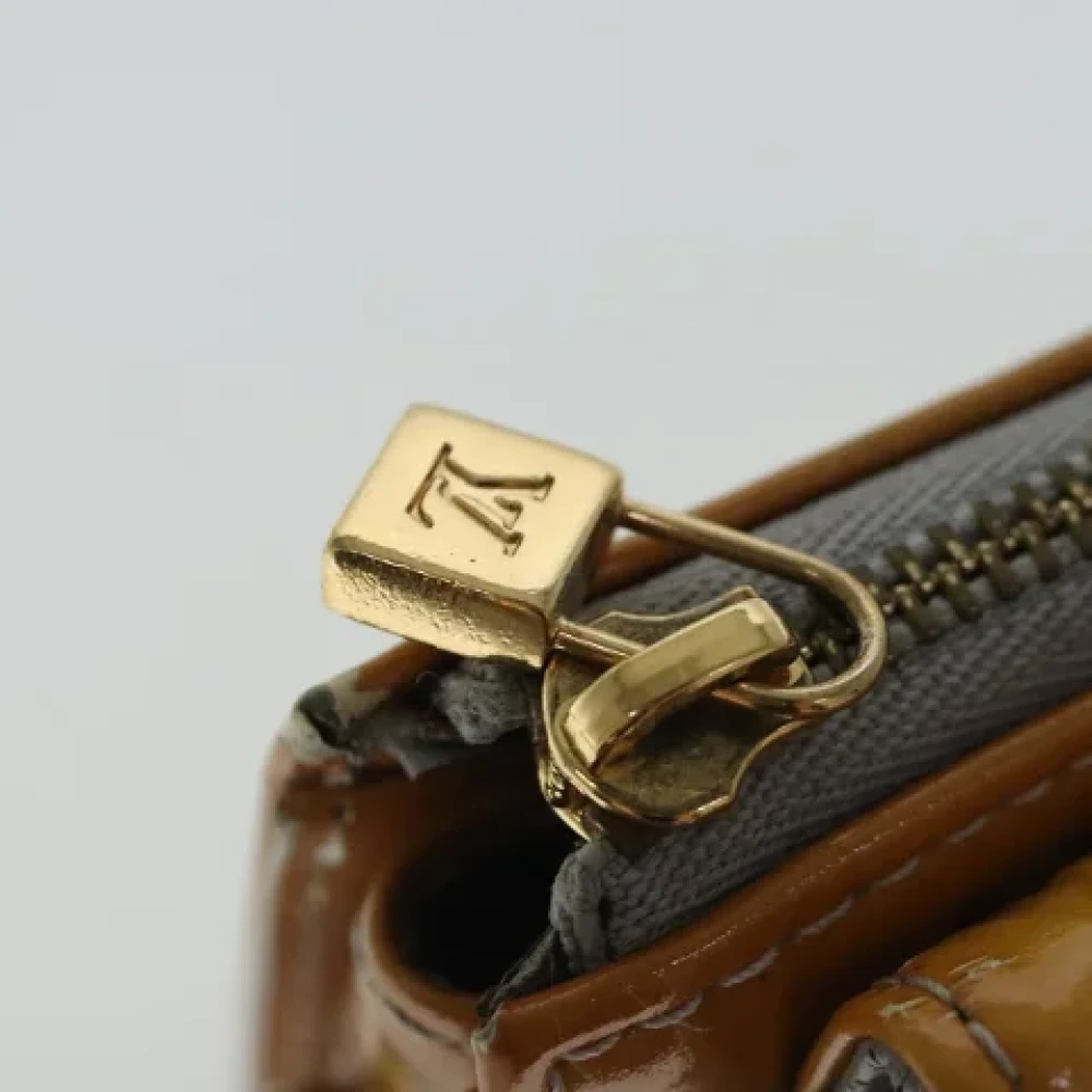 Louis Vuitton Vintage Pre-owned Leather pouches Yellow Dames