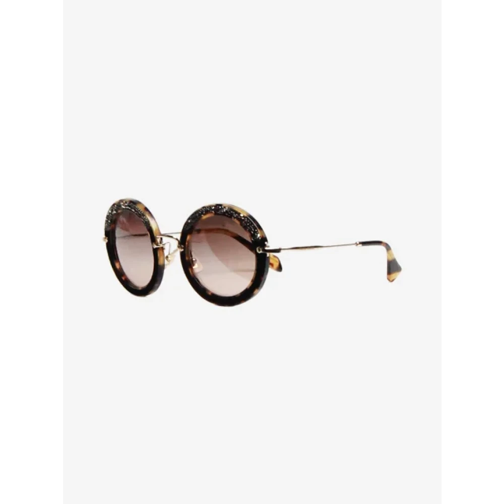 Miu Pre-owned Suede sunglasses Brown Dames