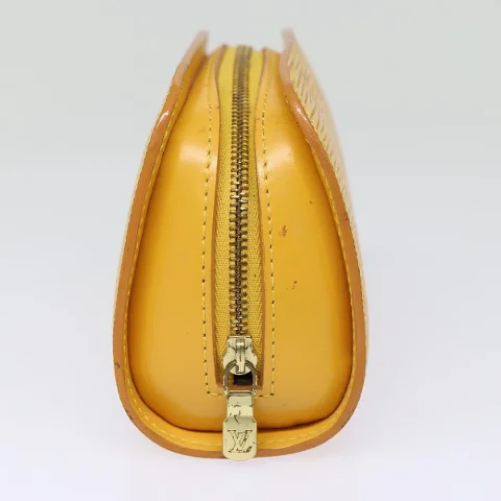 Louis Vuitton Vintage Pre-owned Leather pouches Yellow Dames
