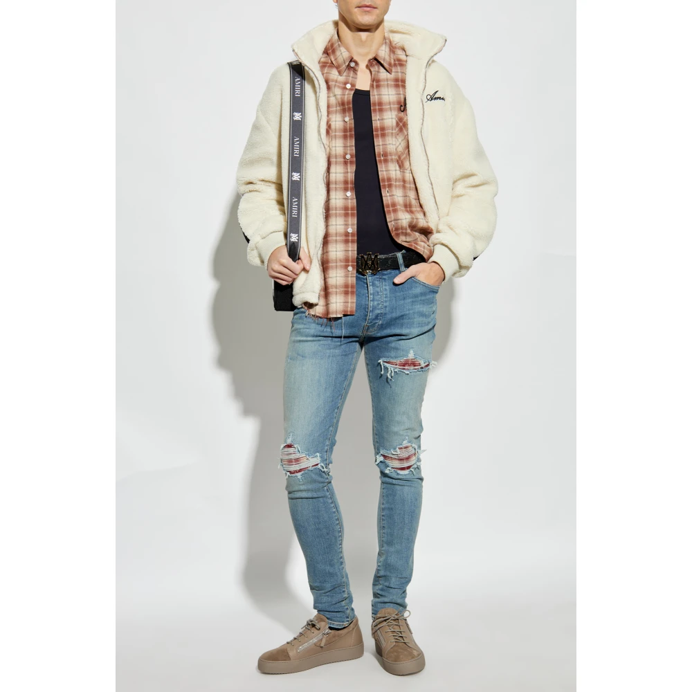Amiri Jeans met patches Blue Heren