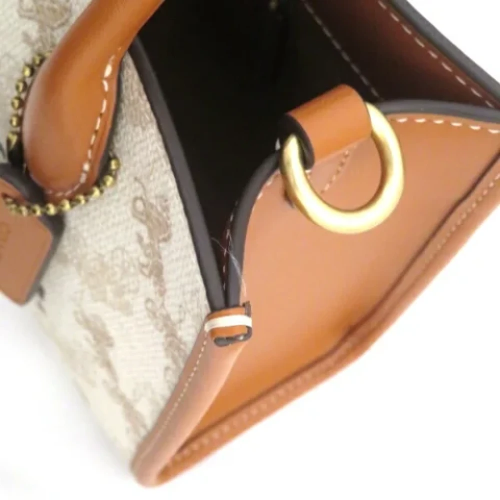 Coach Pre-owned Plastic handbags Beige Dames