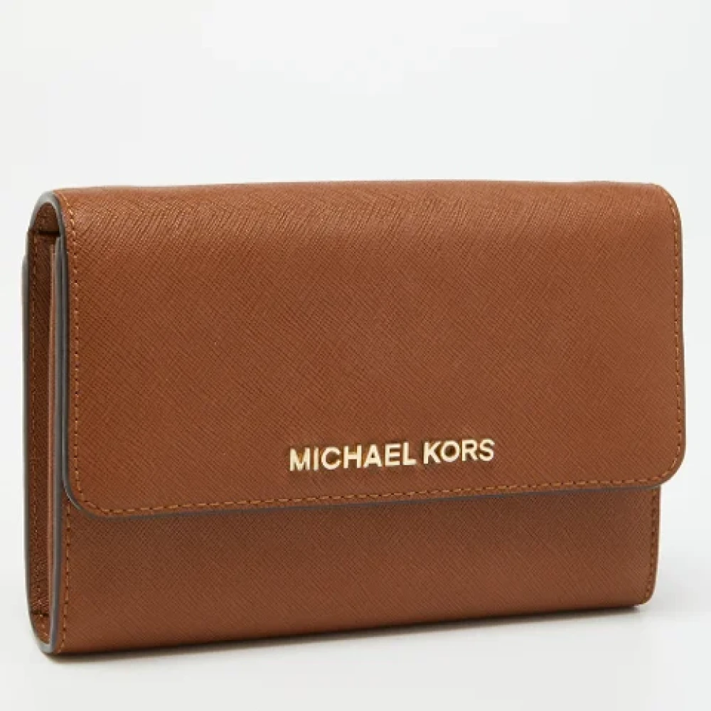 Michael Kors Pre-owned Leather wallets Brown Dames