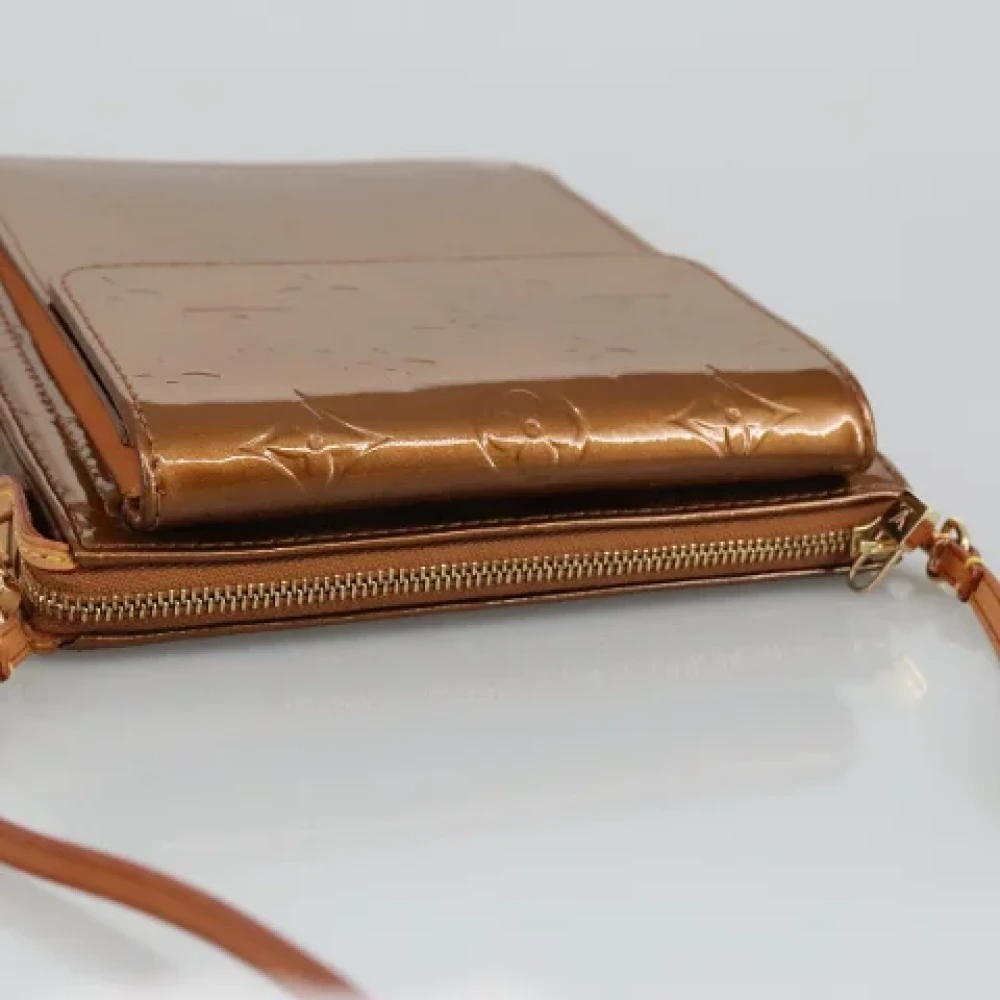 Louis Vuitton Vintage Pre-owned Leather pouches Brown Dames