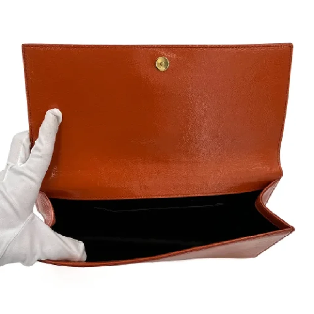 Yves Saint Laurent Vintage Pre-owned Leather clutches Orange Dames