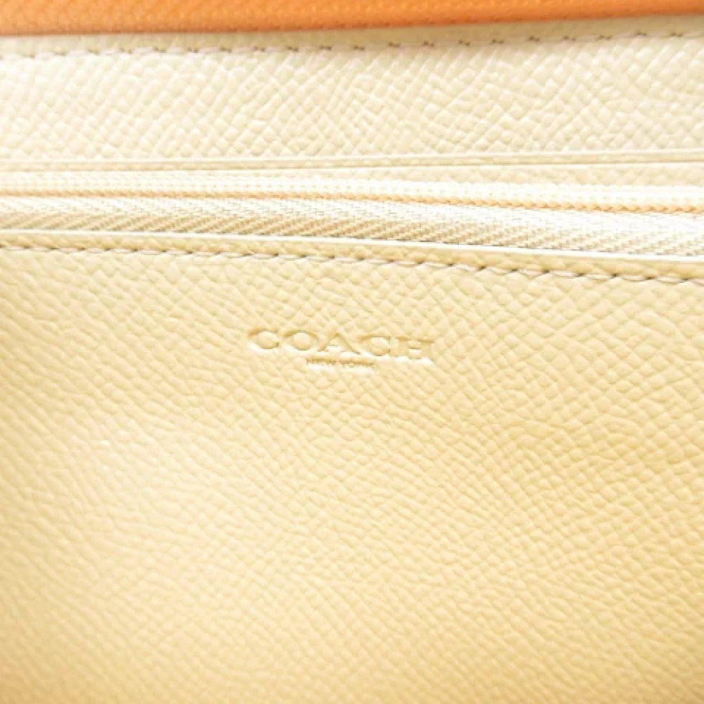 Coach Pre-owned Leather wallets Yellow Dames