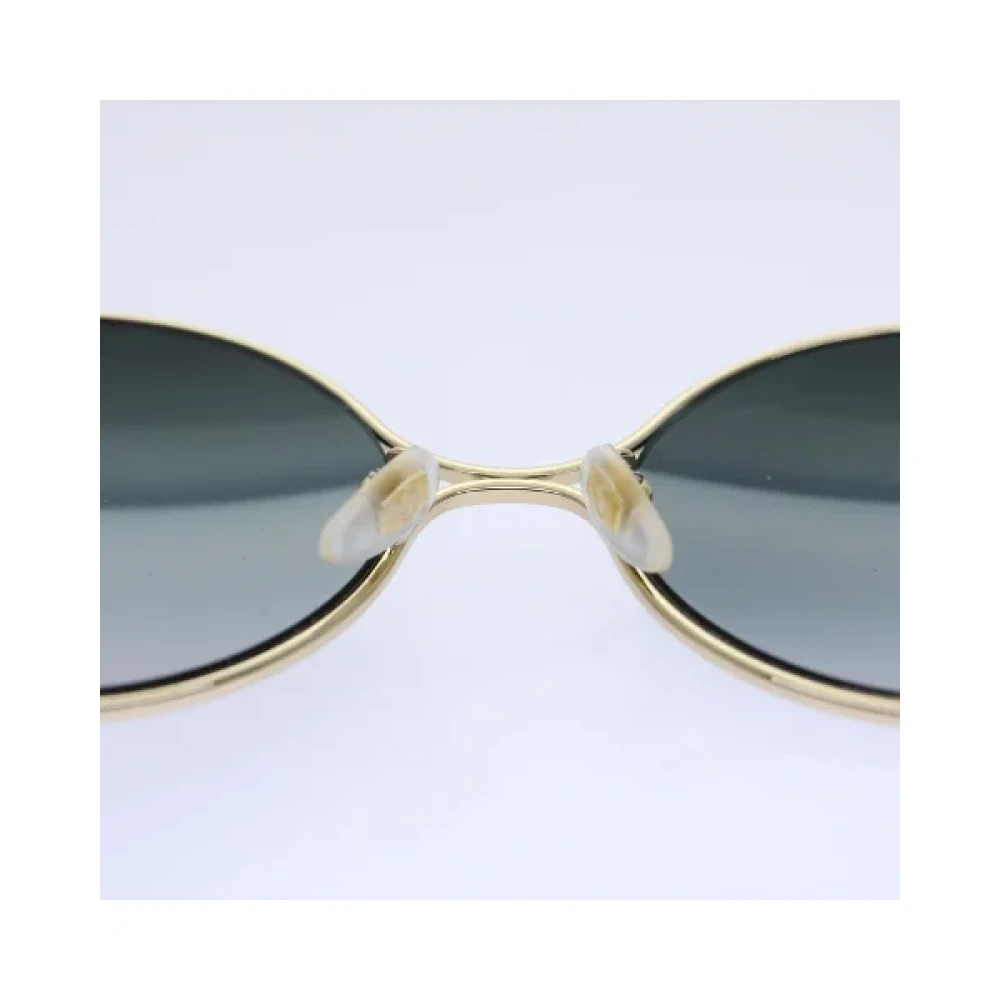 Gucci Vintage Pre-owned Metal sunglasses Yellow Dames