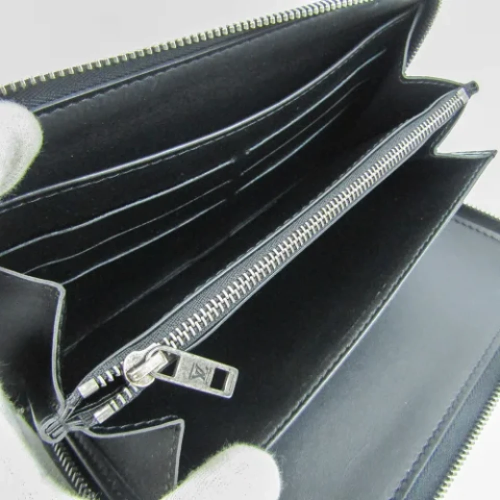 Louis Vuitton Vintage Pre-owned Leather wallets Black Heren