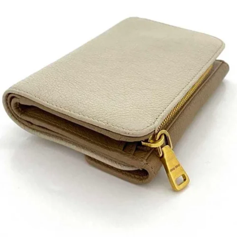 Miu Pre-owned Leather wallets Beige Dames