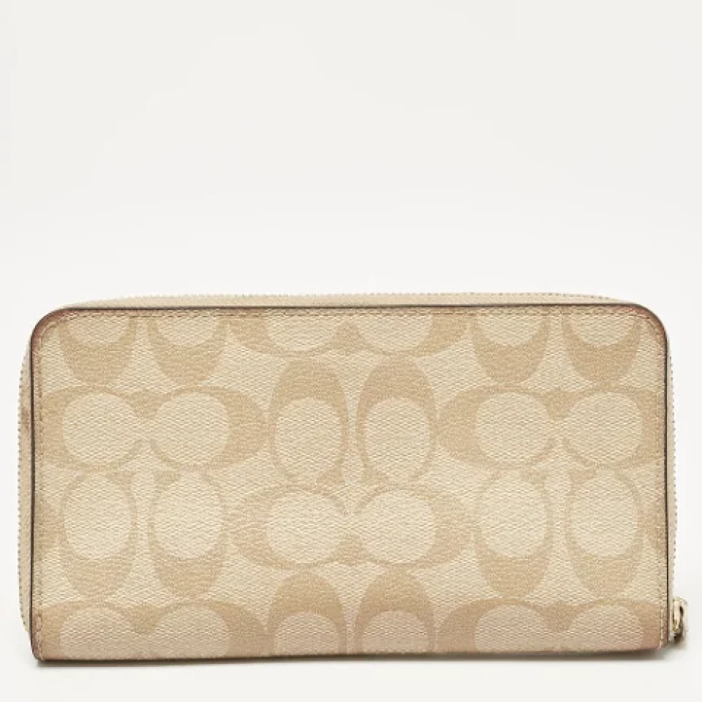 Coach Pre-owned Coated canvas wallets Beige Dames