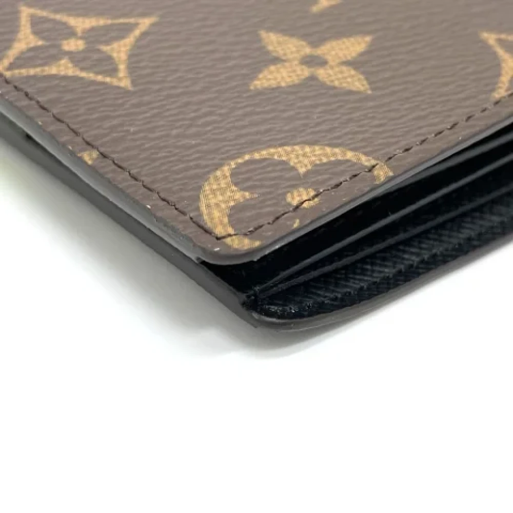 Louis Vuitton Vintage Pre-owned Canvas wallets Brown Heren