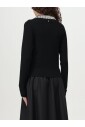 pull-col-roule-noir-luxueux