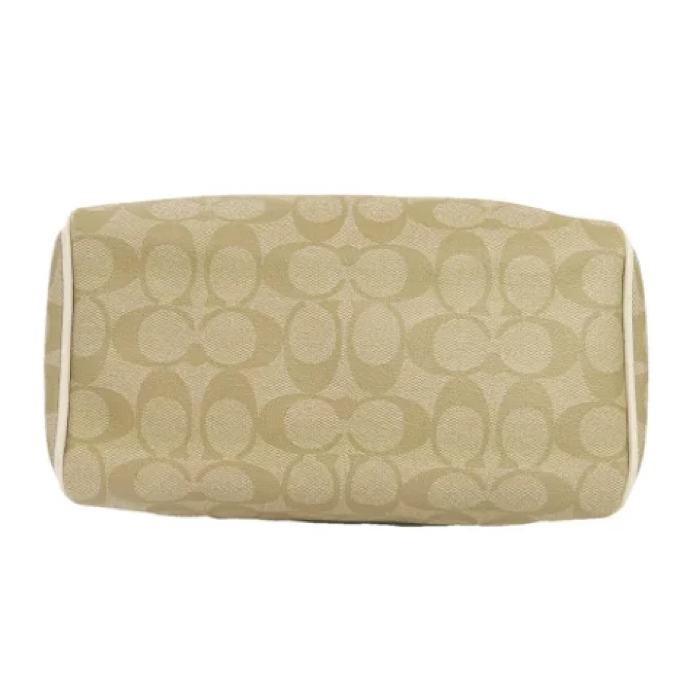 Coach Pre-owned Plastic handbags Beige Dames