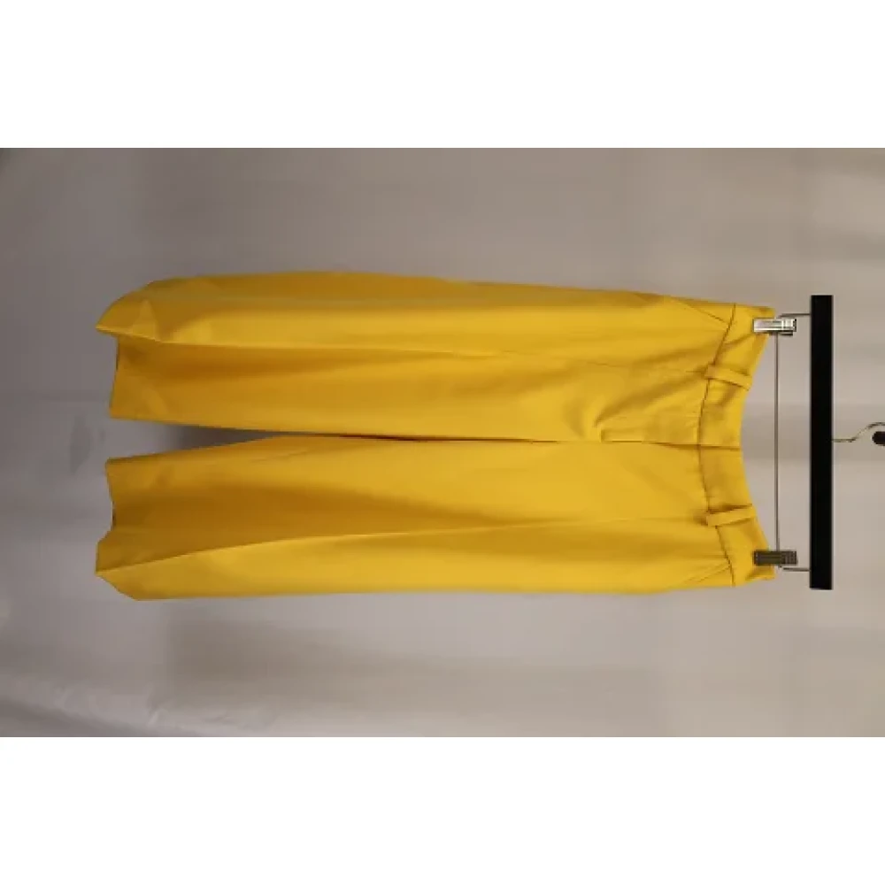 Oscar De La Renta Pre-owned Polyester bottoms Yellow Dames