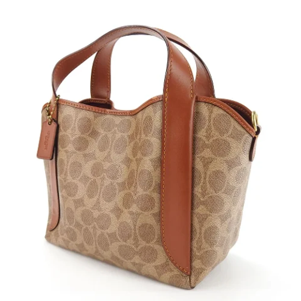 Coach Pre-owned Plastic handbags Brown Dames