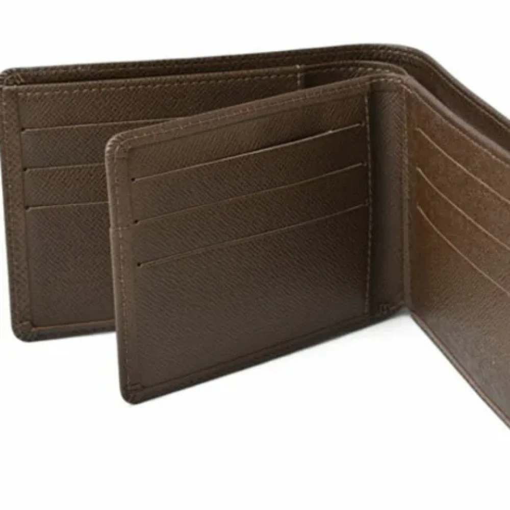 Louis Vuitton Vintage Pre-owned Leather wallets Brown Heren