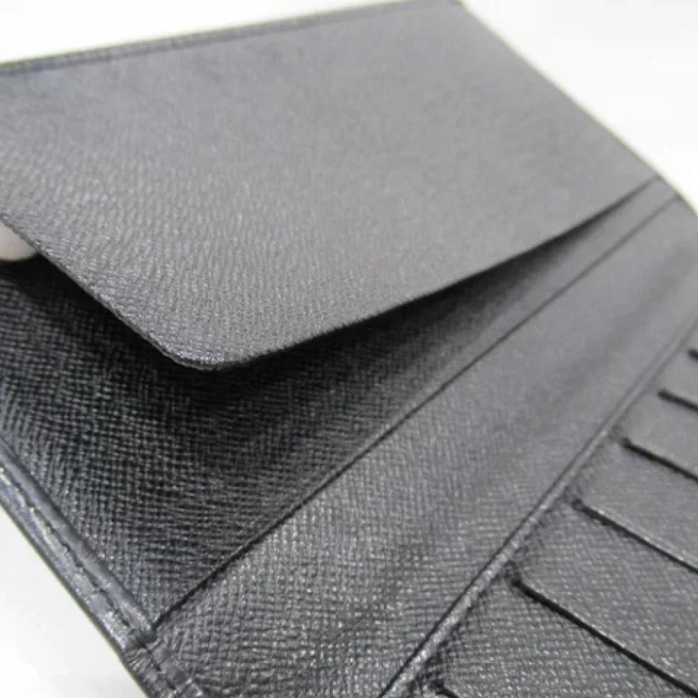 Louis Vuitton Vintage Pre-owned Leather wallets Black Heren