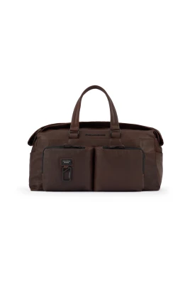 Duffel bag with trolley strap