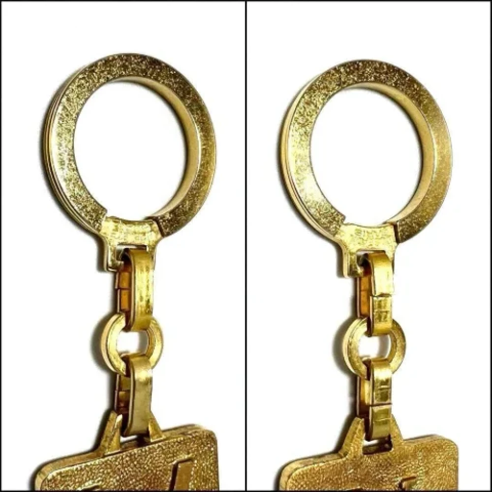 Louis Vuitton Vintage Pre-owned Metal key-holders Yellow Heren