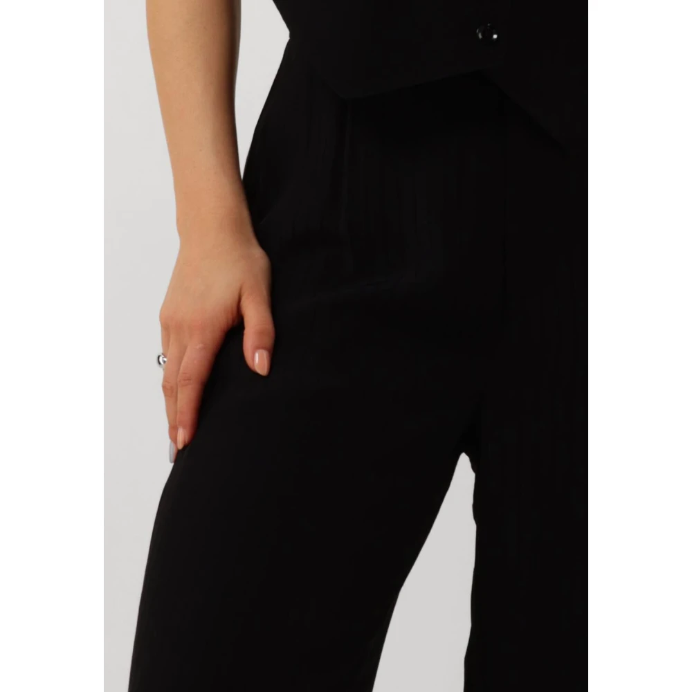 Alix The Label Gestreepte wijde pijpen Black Dames