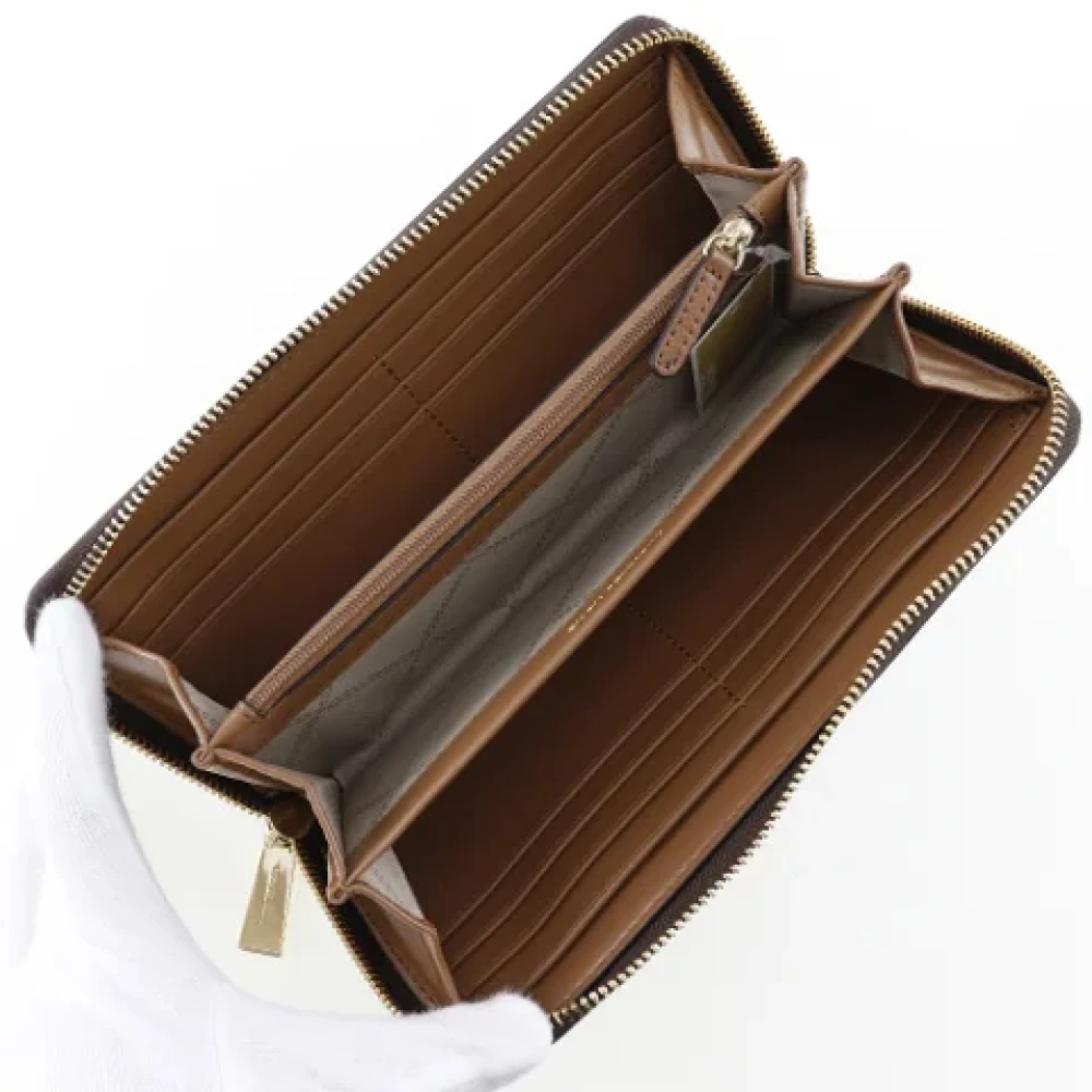 Michael Kors Pre-owned Leather wallets Brown Dames