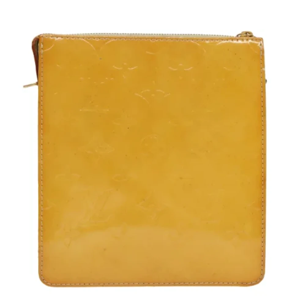 Louis Vuitton Vintage Pre-owned Leather clutches Yellow Dames