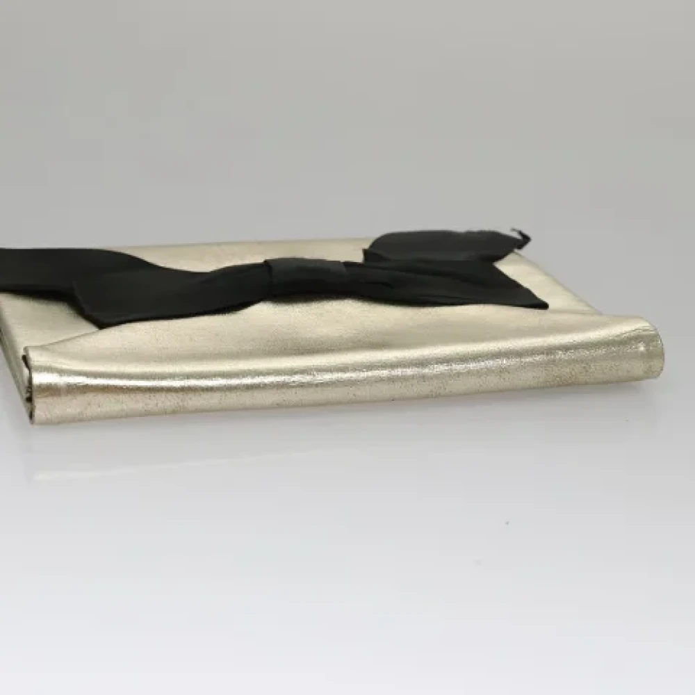 Saint Laurent Vintage Pre-owned Leather clutches Yellow Dames
