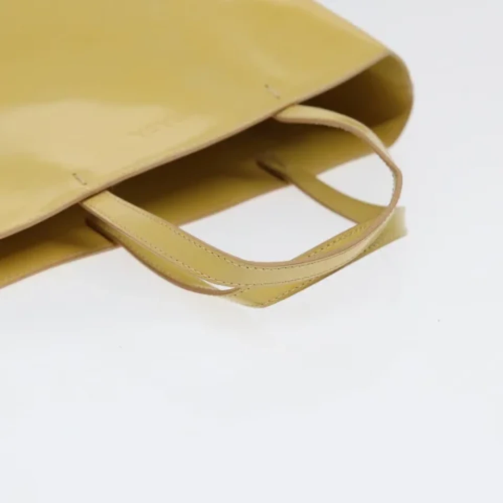 Prada Vintage Pre-owned Coated canvas handbags Yellow Dames