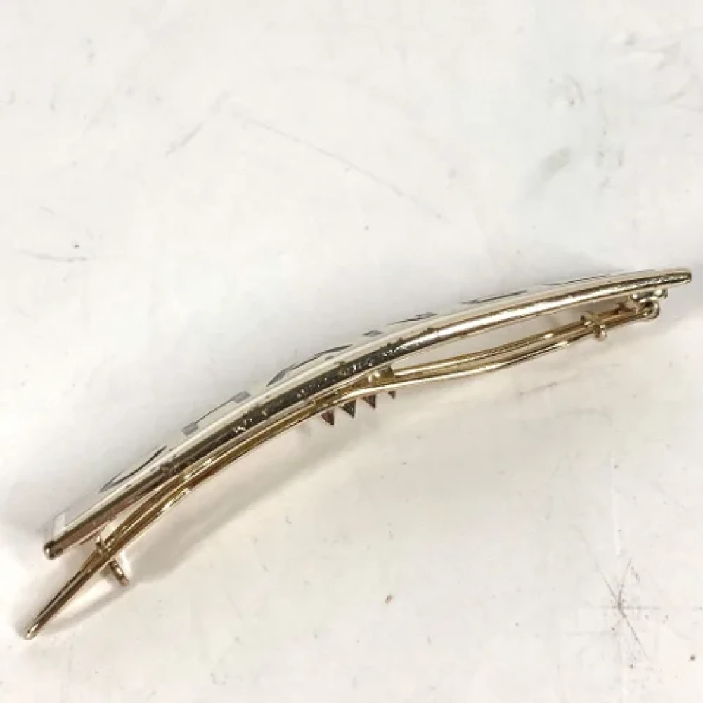 Chanel Vintage Pre-owned Metal hair-accessories Yellow Dames