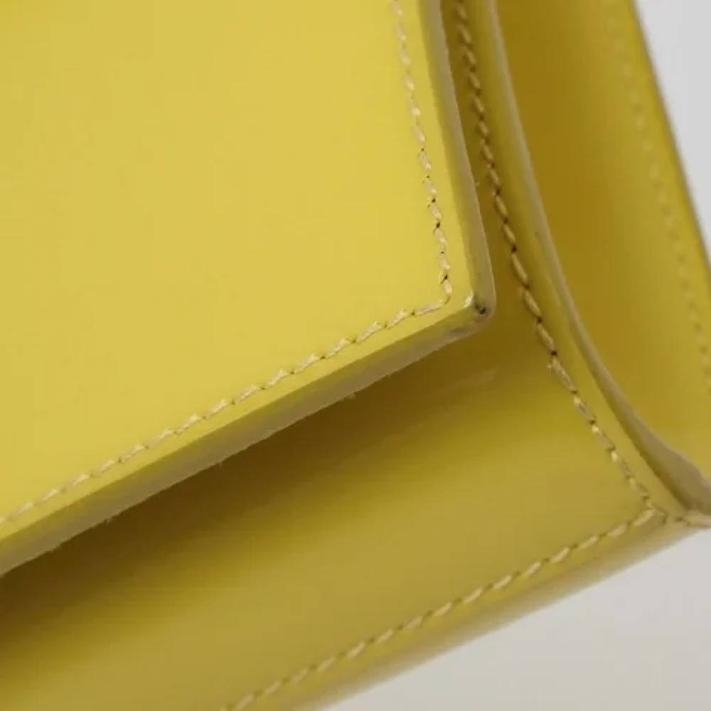 Yves Saint Laurent Vintage Pre-owned Leather clutches Yellow Dames