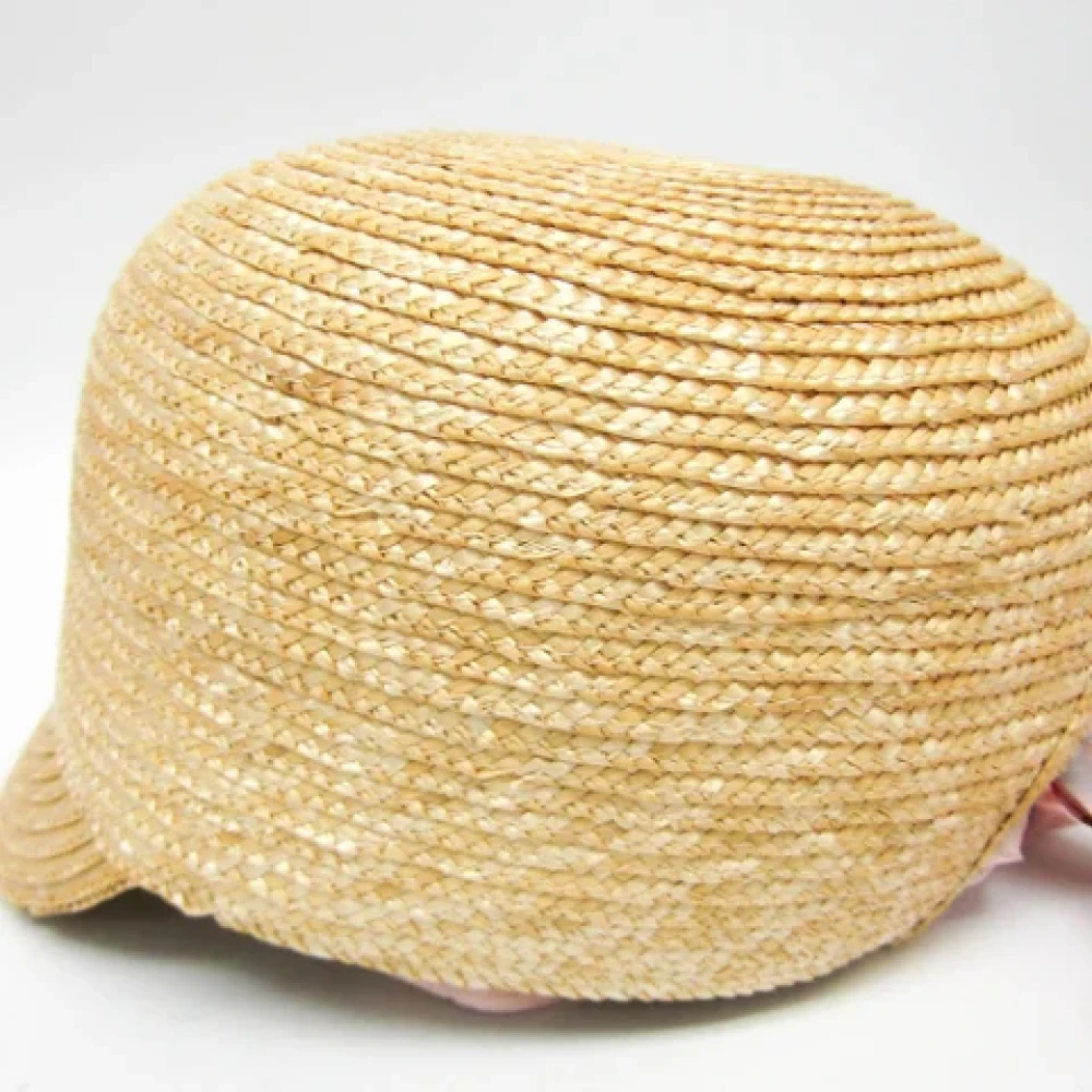 Miu Pre-owned Fabric hats Beige Dames