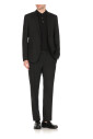 black-wool-suit-with-iconic-pin